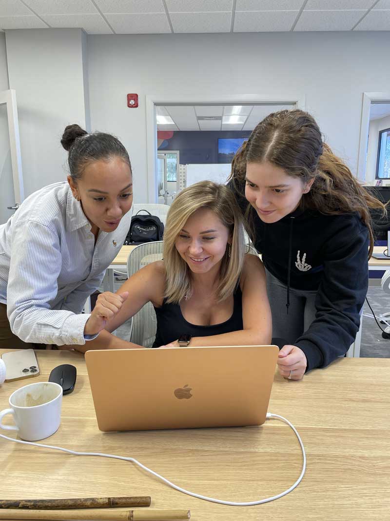 Three of our Scholarship Winners helping each other